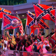 Illustration for article titled Oklahoma Protesters Harass President Obama with Confederate Flags